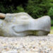 drachen kopf frau sand
